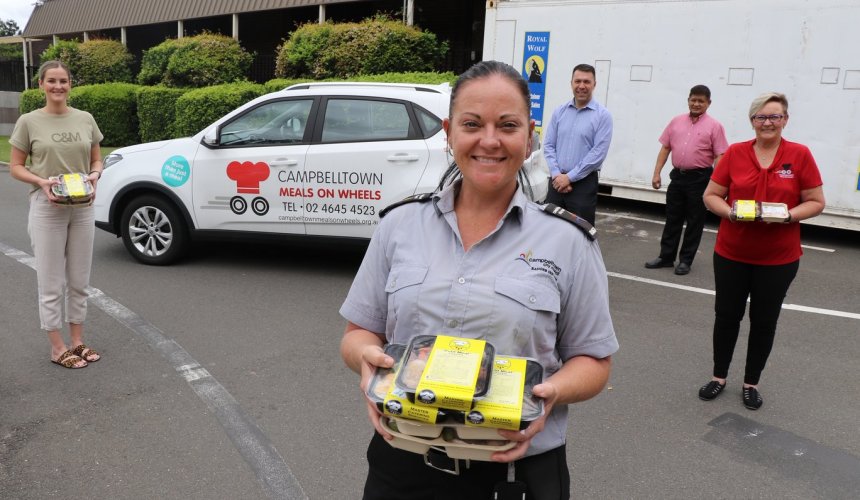 Parking rangers deliver Meals on Wheels